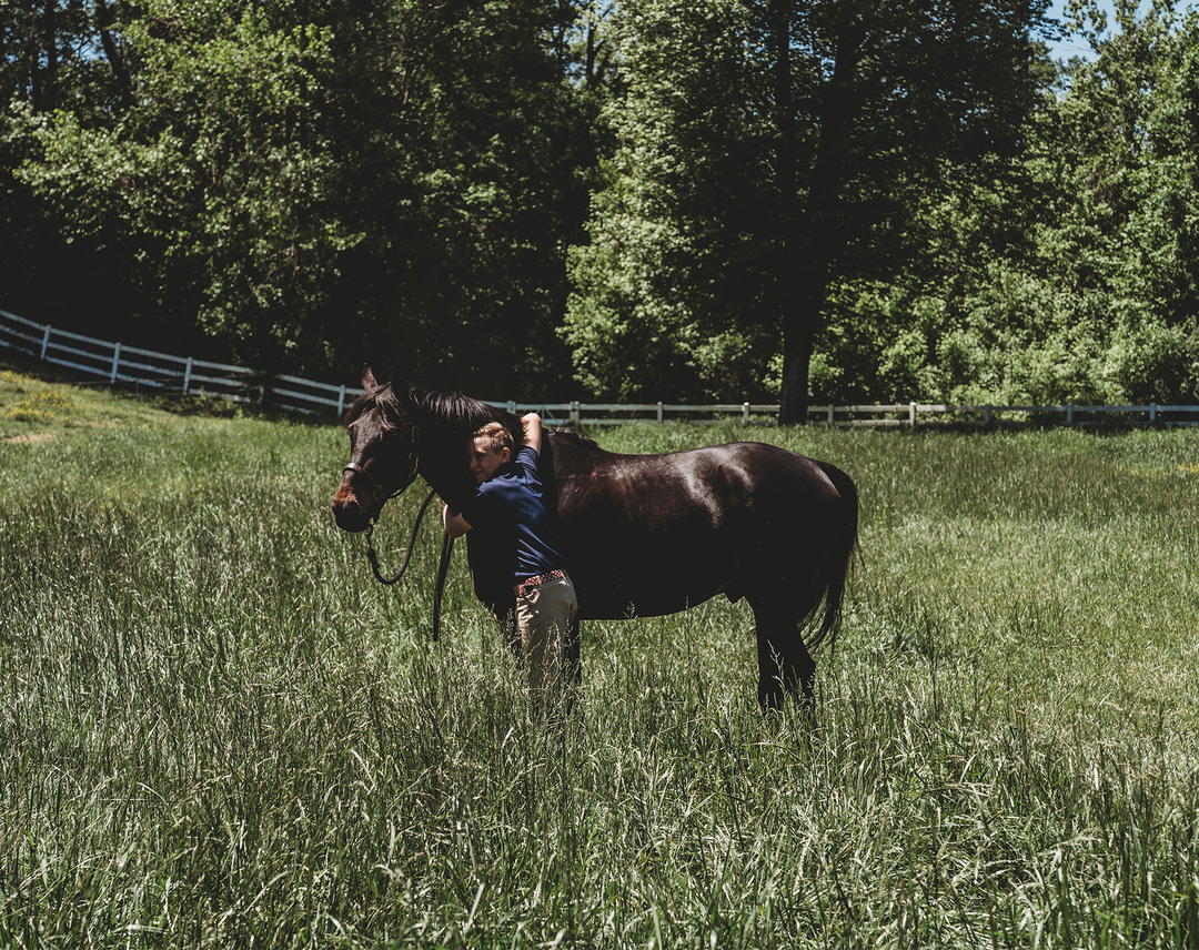 <img src="Horse.jpg" alt="Boy hugging horse" />