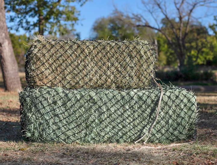Side-by-side comparison of a 2-string small bale and a 3-string West Coast small bale, both secured in Hay Chix slow-feed hay nets to reduce waste and control consumption.