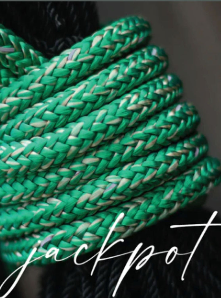 Close-up of Hay Chix® Replacement Rope in the "Jackpot" color, featuring a braided green, tan, and subtle reflective weave.